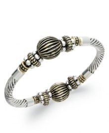 Charter Club's vintage-inspired bracelet will add a decorative flair to your collection with engraved accents and gold tones. Stretches to fit wrist. Crafted in silver tone mixed metal. Approximate diameter: 2-1/2 inches. Charter Club's vintage-inspired bracelet will add a decorative flair to your collection with engraved accents and gold tones. Stretches to fit wrist. Crafted in silver tone mixed metal. Approximate diameter: 2-1/2 inches.