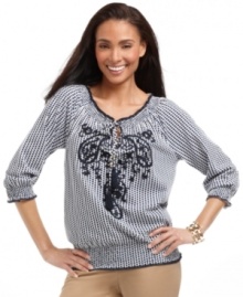 A peasant top gets revamped with a punchy print and paisley embroidery in this Charter Club look. Tassels at the neckline add a luxe touch, too! (Clearance)