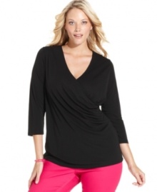 A slimming cross front design elegantly defines Charter Club's three-quarter-sleeve plus size top-- pair it with your favorite casual bottoms.