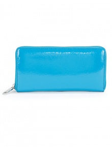 THE LOOKRectangular silhouetteZip-around closureOne outside zip pocketCenter zip compartmentEight card slotsInside logo detailTHE MEASUREMENT8W X 4H X 1DTHE MATERIALPatent leatherCotton twill liningORIGINImported THE LOOKRectangular silhouetteZip-around closureOne outside zip pocketCenter zip compartmentEight card slotsInside logo detailTHE MEASUREMENT8W X 4H X 1DTHE MATERIALPatent leatherCotton twill liningORIGINImported