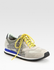 Sporty suede and leather silhouette with textured cotton-blend trim and vibrant laces. Suede and leather upperCotton-blend trimLeather liningRubber solePadded insoleImported