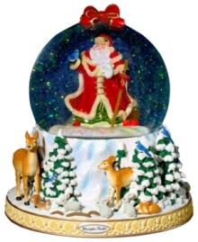 Santa Claus at his most natural. A beautiful winter scene plays out below as Santa is showered with a flurry of shimmering glitter in this elaborate snow globe by Christopher Radko. Santa Claus at his most natural. A beautiful winter scene plays out below as Santa is showered with a flurry of shimmering glitter in this elaborate snow globe by Christopher Radko.