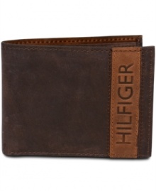 Store your cash in style with this leather logo wallet by Tommy Hilfiger.