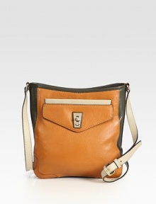 A colorblocked design of butter-soft leather with a front flap pocket. Adjustable shoulder strap, 20-22½ dropTop zip closureOne outside open pocketOne outside flap pocketOne inside zip pocketTwo inside open pocketsLogo-printed lining10½W X 10H X 1¾DImported A colorblocked design of butter-soft leather with a front flap pocket. Adjustable shoulder strap, 20-22½ dropTop zip closureOne outside open pocketOne outside flap pocketOne inside zip pocketTwo inside open pocketsLogo-printed lining10½W X 10H X 1¾DImported