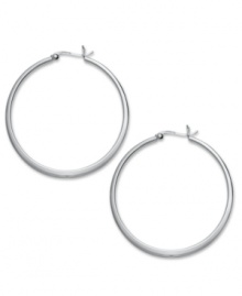 Take your look up a notch with simply stunning hoops. Touch of Silver's thin, polished design is crafted in silver-plated brass with a sterling silver click backing. Approximate diameter: 1-5/8 inches. Take your look up a notch with simply stunning hoops. Touch of Silver's thin, polished design is crafted in silver-plated brass with a sterling silver click backing. Approximate diameter: 1-5/8 inches.