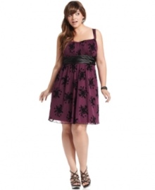 Party the night away in Trixxi's sleeveless plus size dress, featuring a floral print and empire waist.