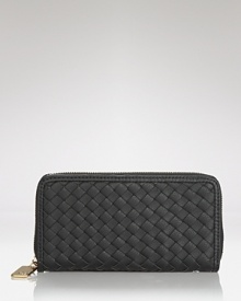 Play up your practical side with this woven vegan leather wallet from Cornelia Guest. Crafted to be cruelty free (and perfectly chic) this piece makes for elegant organization. Play up your practical side with this woven vegan leather wallet from Cornelia Guest. Crafted to be cruelty free (and perfectly chic) this piece makes for elegant organization.