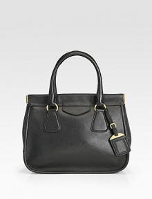 Rich calfskin fitted with a structured frame-top and luggage tag detail.Double top handles, 5 drop Snap top closure Protective metal feet One inside zip pocket Four inside open pockets Leather lining 11W X 9½H X 5½D Made in Italy Rich calfskin fitted with a structured frame-top and luggage tag detail.Double top handles, 5 drop Snap top closure Protective metal feet One inside zip pocket Four inside open pockets Leather lining 11W X 9½H X 5½D Made in Italy