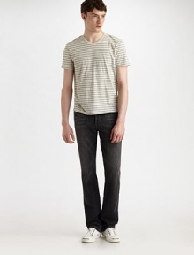 A gently faded, worn-in look in black-washed denim with straight legs and subtle whiskering for character. Five-pocket style Button fly Inseam, about 34 98% cotton/2% elastane Machine wash Made in USA A gently faded, worn-in look in black-washed denim with straight legs and subtle whiskering for character. Five-pocket style Button fly Inseam, about 34 98% cotton/2% elastane Machine wash Made in USA