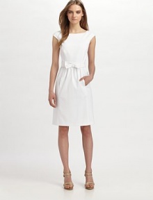 EXCLUSIVELY AT SAKS. This feminine stretch cotton piqué frock has a pretty bow at the waist.Bateau neckline Cap sleeves Concealed back zipper Fully lined About 25 from natural waist 97% cotton/3% spandex Dry clean Made in USA of imported fabric