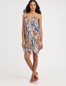 Draped in luxury, an abstract-lotus print coverup with draped details for an ultra-flattering look. Round neckSleevelessFlattering gathered detailsPull-on style95% modal/5% spandexHand washMade in USA of Italian fabric Draped in luxury, an abstract-lotus print coverup with draped details for an ultra-flattering look. Round neckSleevelessFlattering gathered detailsPull-on style95% modal/5% spandexHand washMade in USA of Italian fabric