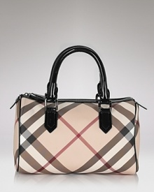 Burberry's iconic check lends luxe style to this classic bowling bag silhouette. Burberry's iconic check lends luxe style to this classic bowling bag silhouette.