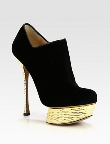 A hammered metal heel and architectural platform lift this runway-worthy velvet silhouette. Hammered painted metal heel, 5½ (140mm)Hammered painted platform, 1½ (40mm)Compares to a 4 heel (100mm)Velvet upperSide zipLeather lining and solePadded insoleMade in Italy A hammered metal heel and architectural platform lift this runway-worthy velvet silhouette. Hammered painted metal heel, 5½ (140mm)Hammered painted platform, 1½ (40mm)Compares to a 4 heel (100mm)Velvet upperSide zipLeather lining and solePadded insoleMade in Italy