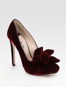 A large bow tops this towering square toe silhouette of lush velvet for a feminine look. Self-covered heel, 4½ (115mm)Hidden platform, ¾ (20mm)Compares to a 3¾ heel (95mm)Velvet upperSquare toeLeather lining and solePadded insoleMade in Italy