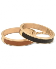 Grab some venomous fashion with this GUESS bracelet set. This set of 2 bangles feature golden bracelets with black and tan snake detail. Crafted in gold tone mixed metal. Approximate diameter: 2-1/4 inches.