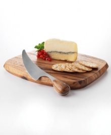 This rustic cheese cutting board and knife set is an artful yet timeless home essential. The comfortable wood handled knife fits conveniently in a carved slot on the round board. The collection of cheese boards is designed by Swedish silversmith Vivianna Torun Bulow Hube. This rustic cheese cutting board and knife set is an artful yet timeless home essential. The comfortable wood handled knife fits conveniently in a carved slot on the round board. The collection of cheese boards is designed by Swedish silversmith Vivianna Torun Bulow Hube.
