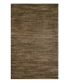 Variegated coloration in subtle striping gives way to modern texture and simple elegance in the Corsica area rug from Liora Manne. Hand-woven in India of pure wool fibers, the Madrid area rug is a comforting, stylish addition to any decor.