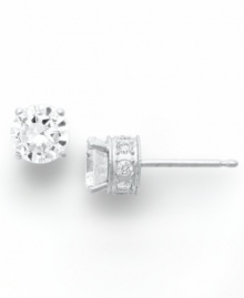 Diamond stud earrings have never sparkled so bright. This unique style features a round-cut diamond at center with a row of round-cut diamonds in the post (1-1/2 ct. t.w.). Four-prong setting crafted in 14k white gold. Approximate diameter: 4-2/5 mm. Diamond stud earrings have never sparkled so bright. This unique style features a round-cut diamond at center with a row of round-cut diamonds in the post (1-1/2 ct. t.w.). Four-prong setting crafted in 14k white gold. Approximate diameter: 4-2/5 mm.