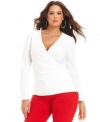 Complete your casual looks with MICHAEL Michael Kors' long sleeve plus size top, accented by zip detail.