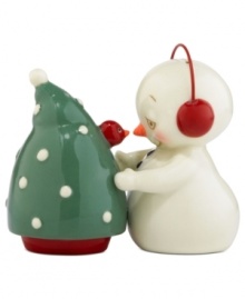 Salt and pepper have never been sweeter. A snowman goes nose to beak with a Christmas cardinal in a Department 56 duo that's worth celebrating year after year.