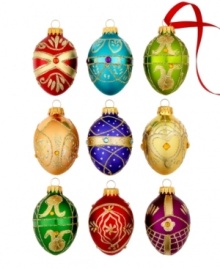 Rich and elaborate, Kurt Adler's bejeweled egg ornaments offer a mix of new and traditional hues with unique patterns rendered in gold and silver glitter.