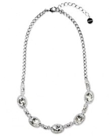 Start with sparkling sophistication. Givenchy's chic collar necklace features Swarovski crystal stone pendants. Crafted in imitation rhodium plated mixed metal. Approximate length: 16 inches + 2-inch extender.