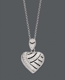 A look you'll simply adore. Victoria Townsend's lovable heart pendant shines with the addition of sparkling diamonds accents. Setting and chain crafted in sterling silver. Approximate length: 18 inches. Approximate drop: 8/10 inch. A look you'll simply adore. Victoria Townsend's lovable heart pendant shines with the addition of sparkling diamonds accents. Setting and chain crafted in sterling silver. Approximate length: 18 inches. Approximate drop: 8/10 inch.
