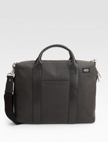 A classically designed case in a fine cotton canvas soaked in a centuries-old paraffin formula for greater strength and abrasion resistance. Zip closure Top handle Adjustable, detachable shoulder strap Interior organizing pockets 16W X 11¾H X 2¾D Imported A classically designed case in a fine cotton canvas soaked in a centuries-old paraffin formula for greater strength and abrasion resistance. Zip closure Top handle Adjustable, detachable shoulder strap Interior organizing pockets 16W X 11¾H X 2¾D Imported
