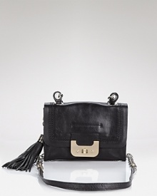 Give into compact cravings with DIANE von FURSTENBERG's chicly sized shoulder bag. In black leather, this versatile mini is a major piece of arm candy. Give into compact cravings with DIANE von FURSTENBERG's chicly sized shoulder bag. In black leather, this versatile mini is a major piece of arm candy.