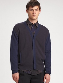 The classic cardigan with a decidedly right-now look. Concealed button frontSlash pocketsAbout 29 from shoulder to hemMerino woolDry cleanImported of Italian fabric The classic cardigan with a decidedly right-now look. Concealed button frontSlash pocketsAbout 29 from shoulder to hemMerino woolDry cleanImported of Italian fabric