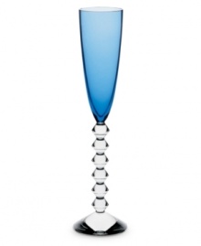 Color it chic. Baccarat takes already-stunning Vega stemware to the next level with this sapphire-tinted flute. A chunky, beaded stem contrasts brilliant color in heavy, exquisitely crafted crystal.