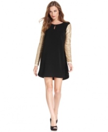 DKNYC's sweet shift silhouette is made party-perfect with sparkling sequined sleeves.