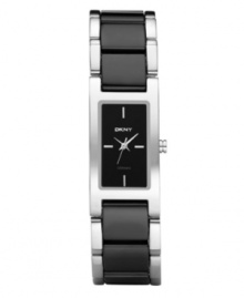 Command attention with this refined watch by DKNY. Stainless steel bracelet with center links of black ceramic and rectangular case. Black dial features silver tone stick indices at twelve, three, six and nine o'clock, three hands and logo. Quartz movement. Water resistant to 50 meters. Two-year limited warranty. Command attention with this refined watch by DKNY. Stainless steel bracelet with center links of black ceramic and rectangular case. Black dial features silver tone stick indices at twelve, three, six and nine o'clock, three hands and logo. Quartz movement. Water resistant to 50 meters. Two-year limited warranty.