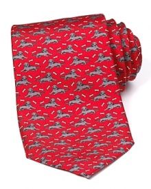 Crafted in luxuriously soft silk, this handsome tie from Vineyard Vines is adorned with a vivid dog pattern. Crafted in luxuriously soft silk, this handsome tie from Vineyard Vines is adorned with a vivid dog pattern.