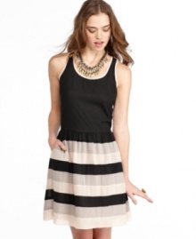 Sporty style meets ladylike cool on this dress from American Rag that pairs a racerback top with the femininity of a striped skirt! Sporty style meets ladylike cool on this dress from American Rag that pairs a racerback top with the femininity of a striped skirt!