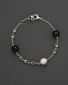 A bold sterling silver chain bracelet, gleaming with blue tigers eye and freshwater pearl. By Di MODOLO. A bold sterling silver chain bracelet, gleaming with blue tigers eye and freshwater pearl. By Di MODOLO.