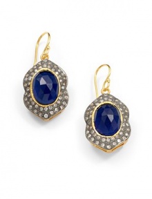 THE LOOKNouveau CollectionBlue corundum and cubic zirconia accents22k yellow goldplated and black ruthenium-plated wave settingHook backTHE MEASUREMENTLength, about 1½ORIGINImported