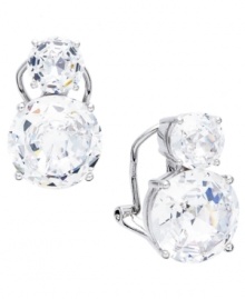 Never go easy on the sparkle. Eliot Danori's stunning stud earrings highlight two, round-cut cubic zirconias (9-1/2 ct. t.w.) set in silver tone mixed metal. Earrings feature a clip-on backing for non-pierced ears. Approximate drop: 3/4 inch. Never go easy on the sparkle. Eliot Danori's stunning stud earrings highlight two, round-cut cubic zirconias (9-1/2 ct. t.w.) set in silver tone mixed metal. Earrings feature a clip-on backing for non-pierced ears. Approximate drop: 3/4 inch.