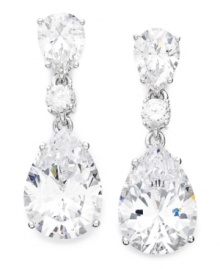 Dazzle 'em with style and shine! Eliot Danori's elegant drop earrings feature a pretty pear shape crafted from sparkling cubic zirconias (12-3/8 ct. t.w.) and silver tone mixed metal. Approximate drop: 1 inch. Dazzle 'em with style and shine! Eliot Danori's elegant drop earrings feature a pretty pear shape crafted from sparkling cubic zirconias (12-3/8 ct. t.w.) and silver tone mixed metal. Approximate drop: 1 inch.