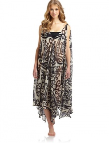THE LOOKExotic inspired print on sheer, flowy chiffonOne dress, so many ways to wear itBelted, one-shoulder, crisscross or bring in 2 points on the hem to cinch the waistIncludes tag with styling optionsV-neckAsymmetrical hemLong side slitsTHE FITAbout 45 from shoulder to longest point of hemTHE MATERIALPolyesterCARE & ORIGINHand washMade in USAPlease note: One size fits most. 