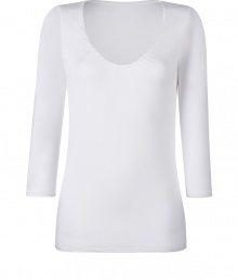 Stylish T-shirt in white stretch rayon - very soft and pleasant quality - low scoop neck - sleeves in discreet 3/4 length, ideal for women who dont like to reveal their arms or wear the top at the office - slim and slightly waist fitted - new basic - feminine and comfortable alternative for a blouse - wear with a pant suit, pleated skirt, cardigan Stylish T-shirt in white stretch rayon - very soft and pleasant quality - low scoop neck - sleeves in discreet 3/4 length, ideal for women who dont like to reveal their arms or wear the top at the office - slim and slightly waist fitted - new basic - feminine and comfortable alternative for a blouse - wear with a pant suit, pleated skirt, cardigan