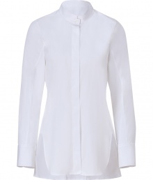 Perfect for layering over slim-cut separates, Jil Sanders stand-up collar blouse is essential for modern-minimalist looks - Stand-up collar, long sleeves, wide buttoned cuffs, hidden button-down front, slit sides, curved hemline - Longer length, tailored fit - Wear with bright skinnies, flats and sleek leather totes