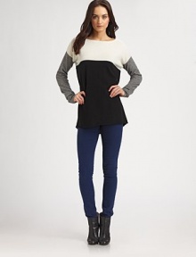 Slouchy-chic boatneck of wool and cashmere has dropped shoulders, long dolman sleeves and a modern colorblock pattern. BoatneckDropped shouldersLong dolman sleevesHi-low hem hits below the hips70% wool/30% cashmereDry cleanImportedModel shown is 5'10 (177cm) wearing US size Small.