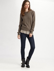 Wool-rich crewneck has a touch of cashmere and silk-rich contrast hem with metallic details. Ribbed crewneckLong sleevesRibbed cuffs83% silk/17% lurex contrast hem90% wool/10% cashmereDry cleanImportedModel shown is 5'9½ (176cm) wearing US size 4.