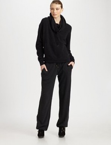 Laid-back meets luxe in these wool-blend track pants, finished with ribbed cuffs and a comfortable drawstring waist.Adjustable drawstring waistSlash side pocketsBack flap-patch pocketsInseam, about 3079% cotton/21% polyesterDry cleanImported