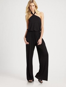 Modified by a halter top, elastic drop waist and wide-leg construction this retro-cool design will carry you through the seasons. Front tie halter with keyhole detailElastic drop waistSlash pocketsAbout 59 from shoulder to hem92% modal/8% spandexDry cleanMade in USAModel shown is 5'10 (177cm) wearing US size Small. Modified by a halter top, elastic drop waist and wide-leg construction this retro-cool design will carry you through the seasons. Front tie halter with keyhole detailElastic drop waistSlash pocketsAbout 59 from shoulder to hem92% modal/8% spandexDry cleanMade in USAModel shown is 5'10 (177cm) wearing US size Small.