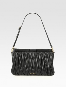This beautifully quilted style has a convenient detachable shoulder strap.Detachable adjustable shoulder strap, 8-9 dropTop zip closureOne inside open pocketSatin lining10W X 6½H X ½DMade in Italy This beautifully quilted style has a convenient detachable shoulder strap.Detachable adjustable shoulder strap, 8-9 dropTop zip closureOne inside open pocketSatin lining10W X 6½H X ½DMade in Italy