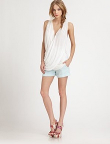 An airy sleeveless top, elegantly draped in a sophisticated wrap-front silhouette.V necklineSleevelessWrap frontButton-top back keyholeAbout 30 from shoulder to hemShell: rayon; front panel: silkDry cleanImportedModel shown is 5'9 (175cm) wearing US size Small.
