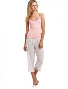 THE LOOKLace-trimmed slight v-neckAdjustable strapsTHE FITAbout 22 from shoulder to hemTHE MATERIAL90% nylon/10% lycraCARE & ORIGINHand washMade in USAModel shown is 5'10 (177cm) wearing US size Small. THE LOOKLace-trimmed slight v-neckAdjustable strapsTHE FITAbout 22 from shoulder to hemTHE MATERIAL90% nylon/10% lycraCARE & ORIGINHand washMade in USAModel shown is 5'10 (177cm) wearing US size Small.