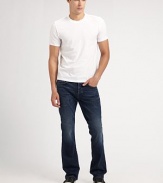 Modern, 11-ounce stretch denim is finished with a dark indigo dye and soft fading for a worn-in look and feel. Five-pocket style Button fly Signature back pocket embroidery Inseam, about 34 98% cotton/2% spandex Machine wash Made in USA 